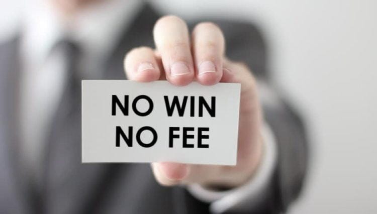 Hand showing business card with text "No win No fee"